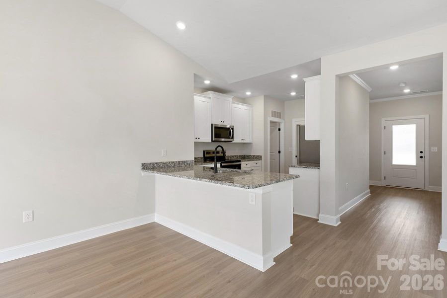 Furnished interior view inside a new home in Ascot Woods, Charlotte (Image 3).