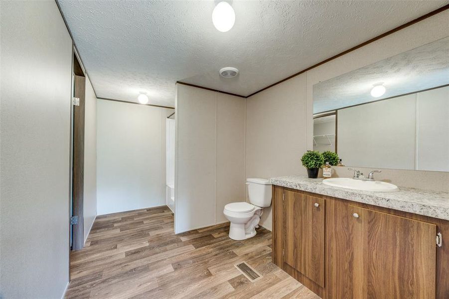 Large primary bath with large closet.