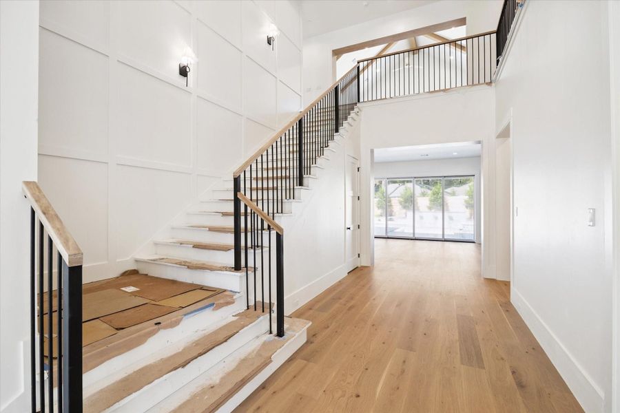 The impressive high ceiling captures you as soon as you enter the front door. The impressive high ceiling captures you as soon as you enter the front door.