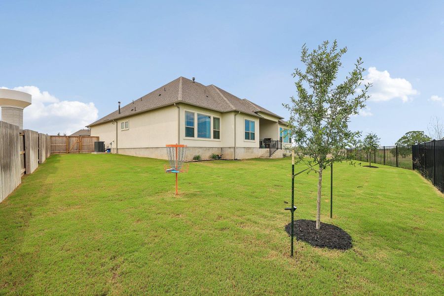 Exterior details and patio area of a home in The Colony- Driscoll Bluffs, Bastrop (Image 3).