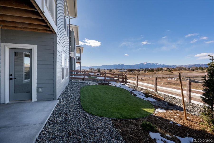 Exterior details and patio area of a home in Revel Crossing at Wolf Ranch - The Panorama Collection, Colorado Springs (Image 3).