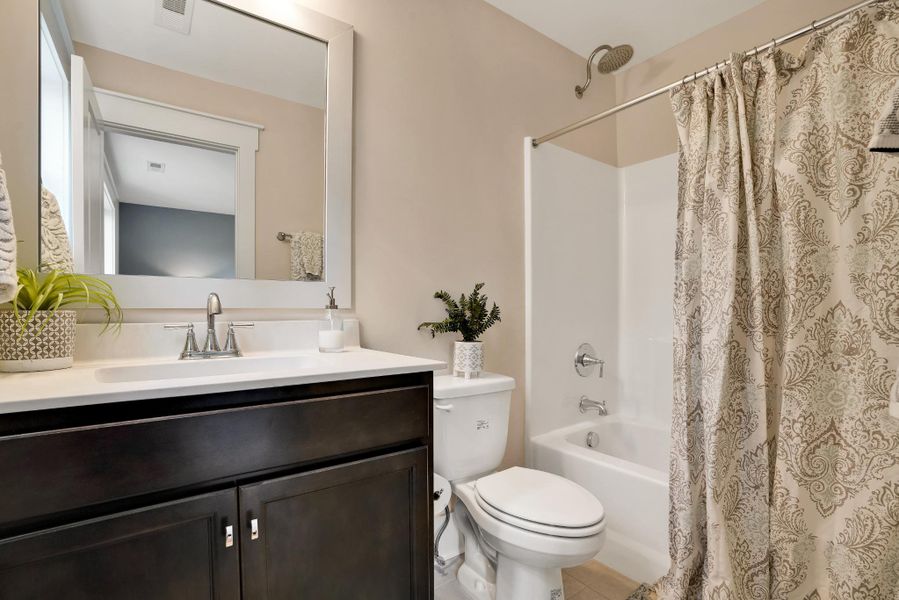 Representative furnished interior of a home built from the Harrison by Bill Clark Homes in Sidbury Landing, Wilmington (Image 43).