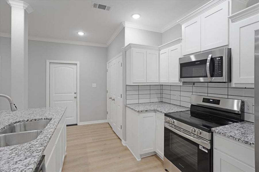 Furnished interior view inside a new home in , Denison (Image 6). Furnished interior view inside a new home in , Denison (Image 6).