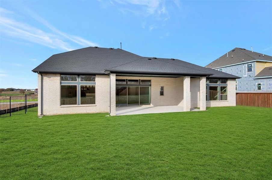 Exterior details and patio area of a home in Northshore at Lakewood Village - Estate Series, Lakewood Village (Image 3).