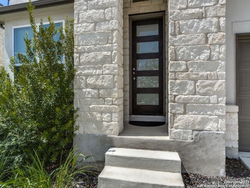 Front exterior of a new home in Regent Park, Boerne, TX, highlighting curb appeal (Image 2).