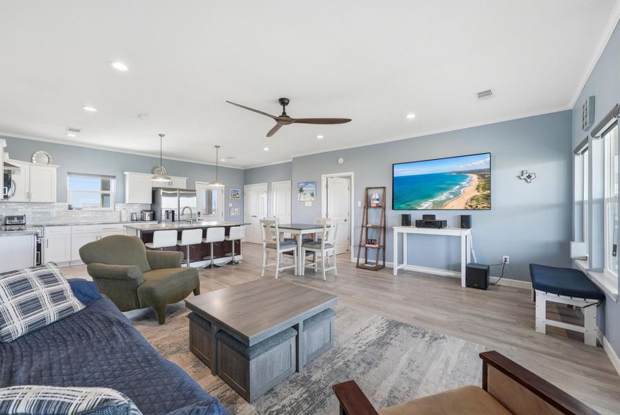 open-concept living area with modern kitchen open-concept living area with modern kitchen