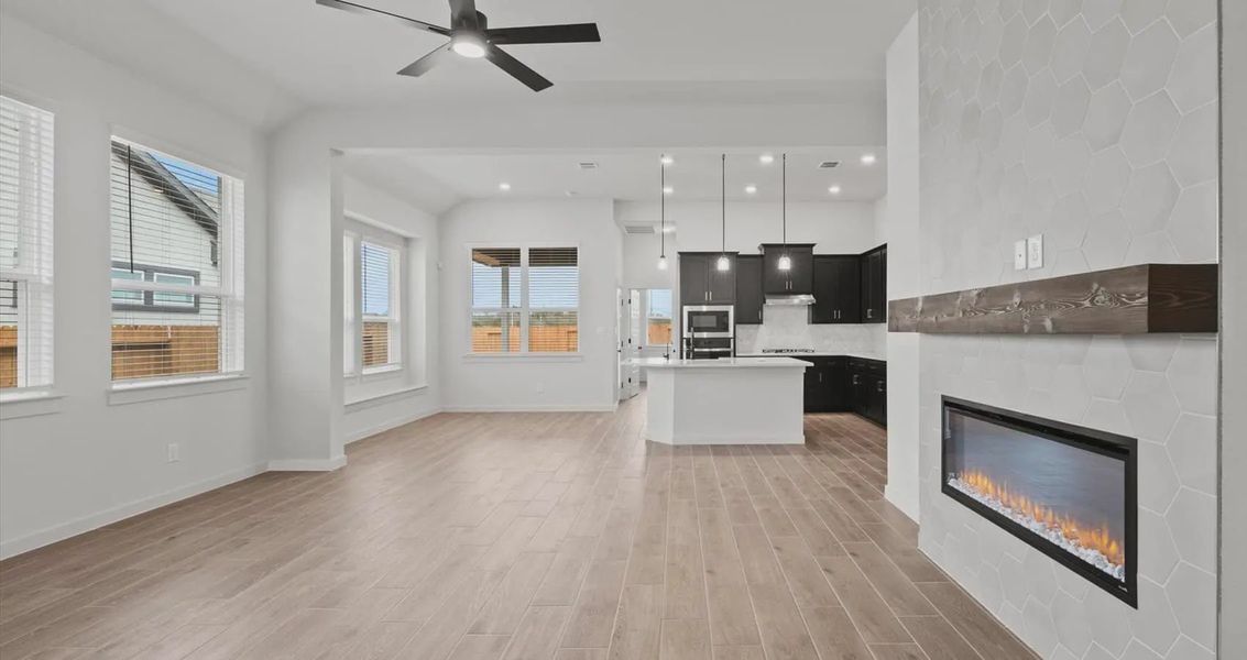 Image 9 representing the Rhyan by Chesmar Homes in Stream Waters, Buda, TX.