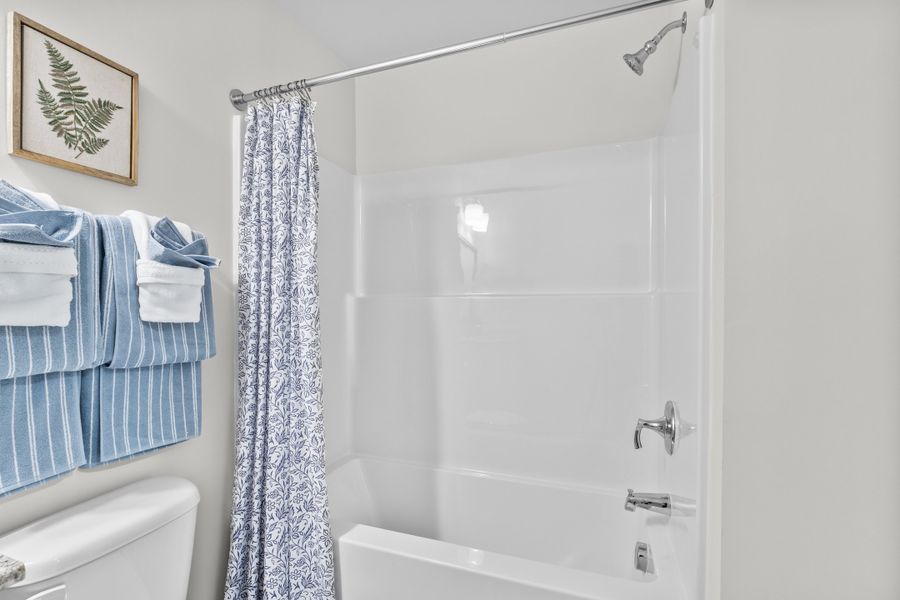 Representative furnished interior of a home built from the Hickory by McGuinn Homes in Greenlawn Village, Columbia (Image 25).