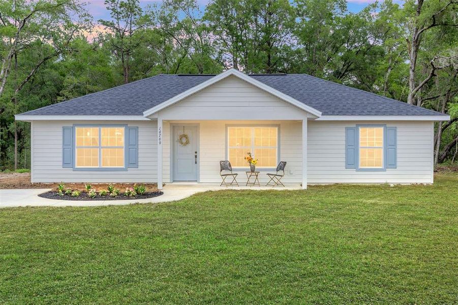 Front exterior of a new home in , Ocala, FL, highlighting curb appeal (Image 18).