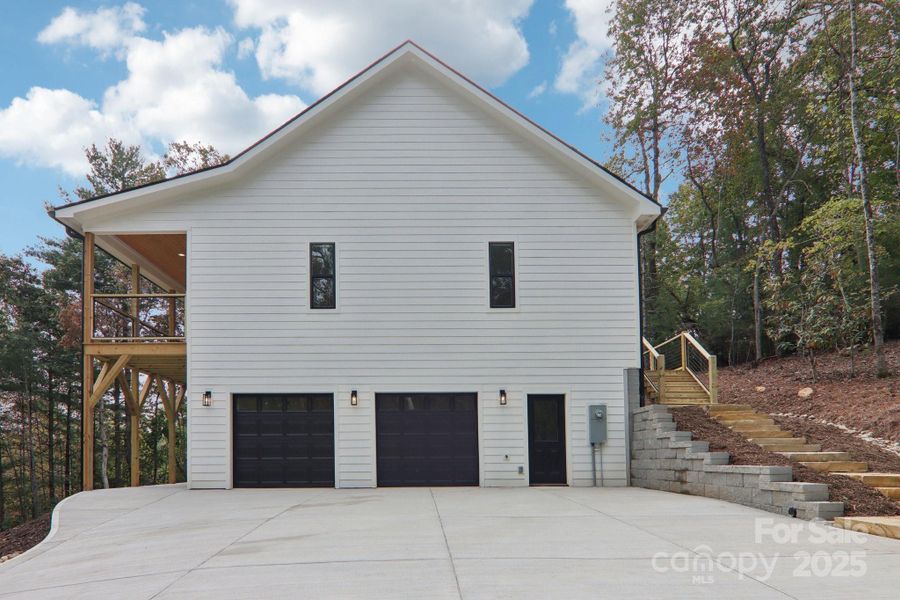 Front exterior of a new home in , Mills River, NC, highlighting curb appeal (Image 1). Front exterior of a new home in , Mills River, NC, highlighting curb appeal (Image 1).