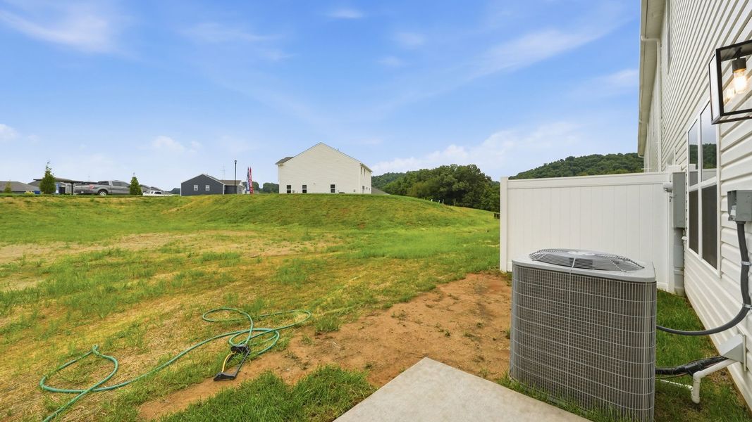 Exterior details and patio area of a home in Fieldcrest Acres Townhomes, Blountville (Image 15).