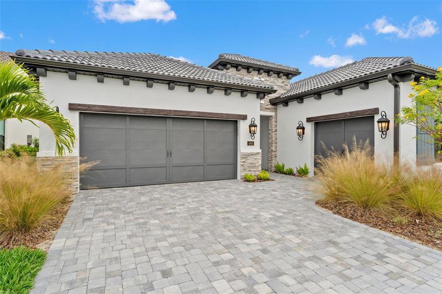 Front exterior of a new home in , Nokomis, FL, highlighting curb appeal (Image 27). Front exterior of a new home in , Nokomis, FL, highlighting curb appeal (Image 27).