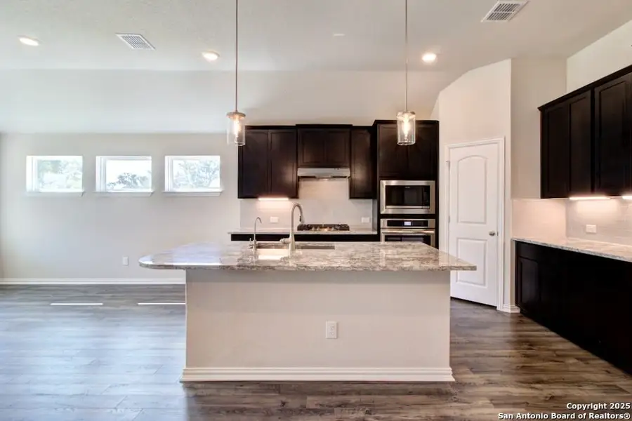 Furnished interior view inside a new home in Veranda, San Antonio (Image 4).