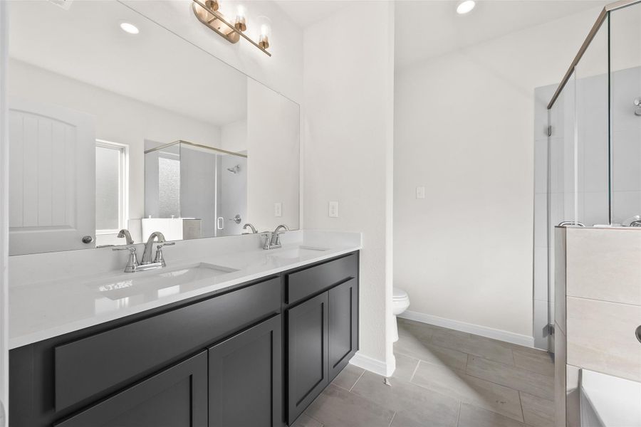 Furnished interior view inside a new home in Enclave at Dobbin, Magnolia (Image 13).