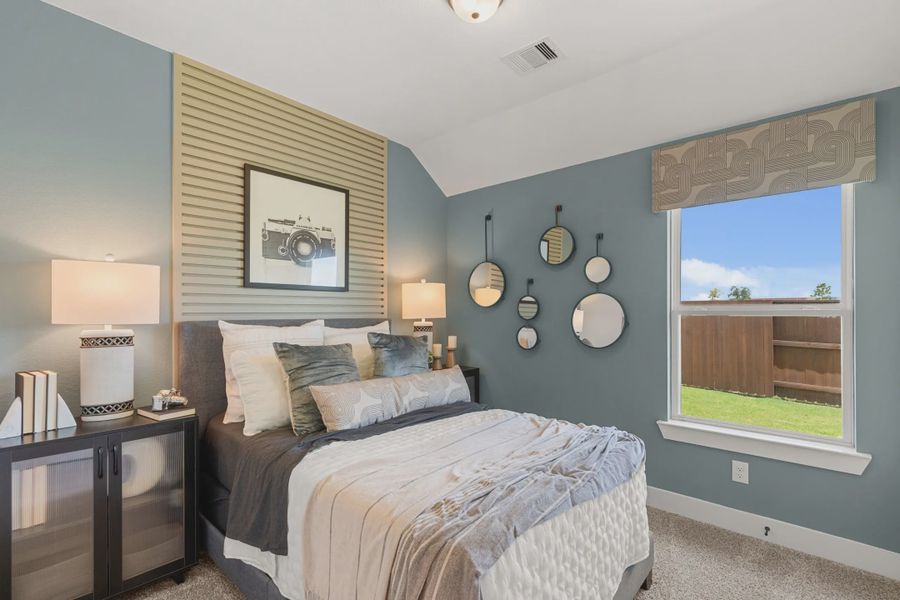Representative furnished interior of a home built from the Countryside by Chesmar Homes in Meridiana Townhomes, Iowa Colony (Image 7).