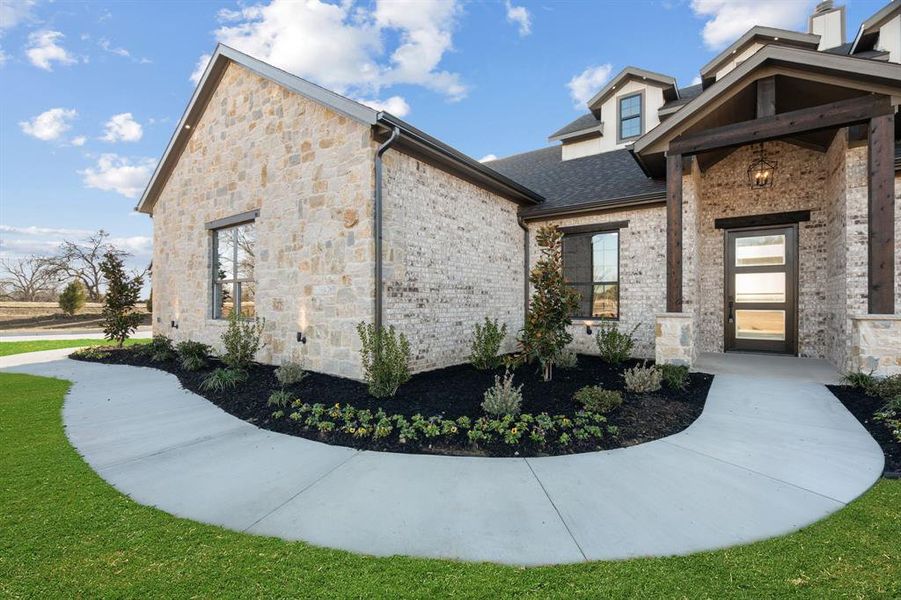 Front exterior of a new home in , Farmersville, TX, highlighting curb appeal (Image 27).