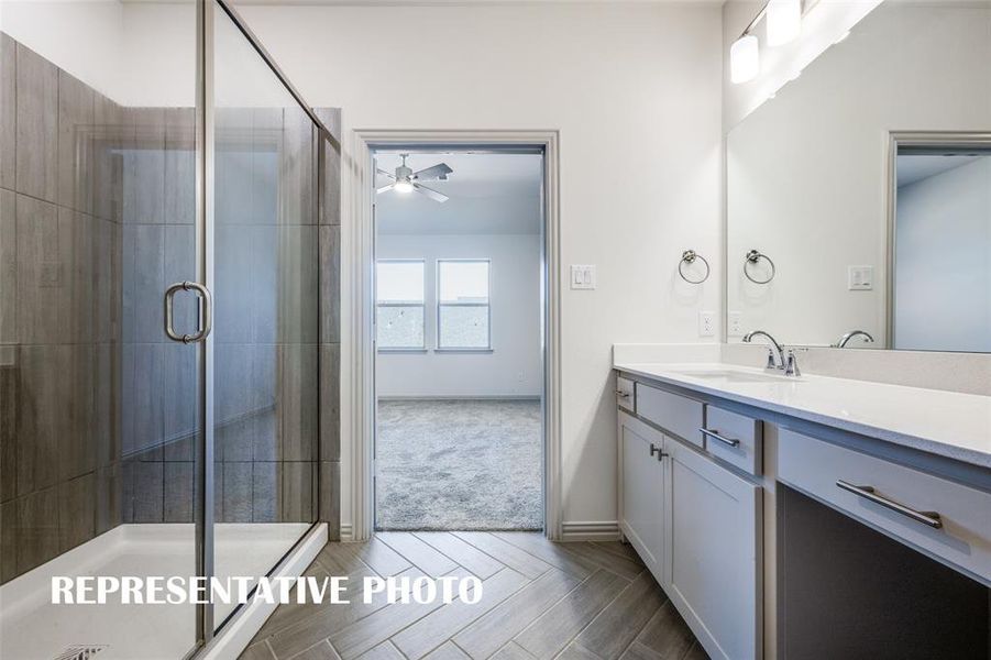 This oversized, walk in shower is the perfect place to start or end your day!  REPRESENTATIVE PHOTO.