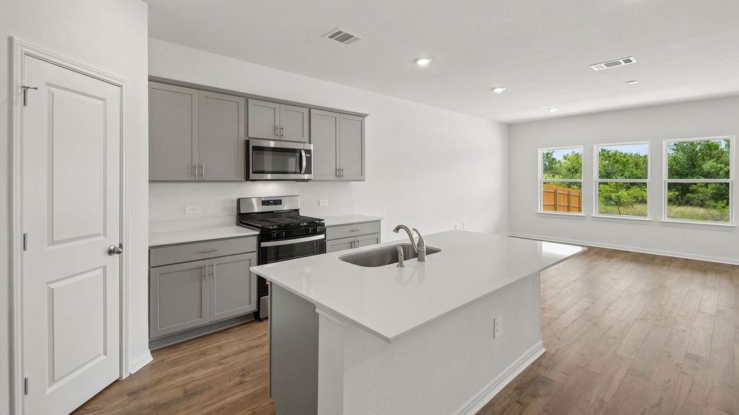 Furnished interior view inside a new home in Prairie Lakes, Buda (Image 6).
