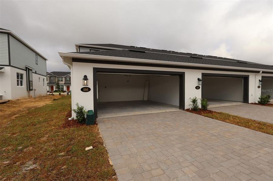 Exterior details and patio area of a home in Emerson Pointe, Apopka (Image 18). Exterior details and patio area of a home in Emerson Pointe, Apopka (Image 18).
