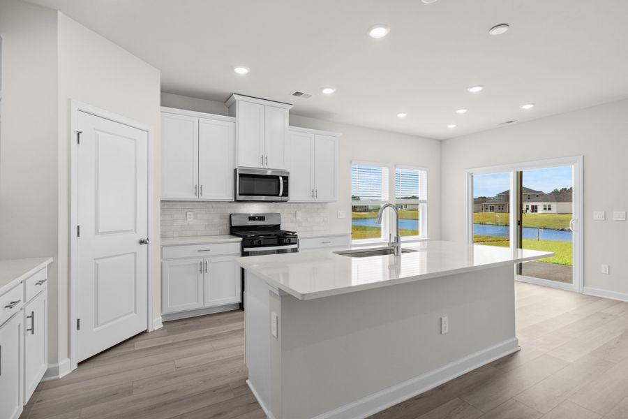 Furnished interior view inside a new home in Cypress Ridge - The Coastline Series, Longs (Image 3).