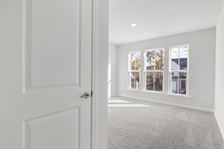 Spacious, unfurnished interior of a new home in Poets Walk, Whitsett (Image 25).