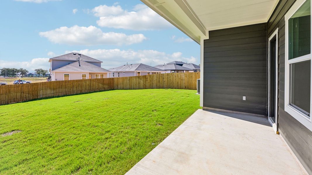 Exterior details and patio area of a home in Valverde, Bastrop (Image 4).