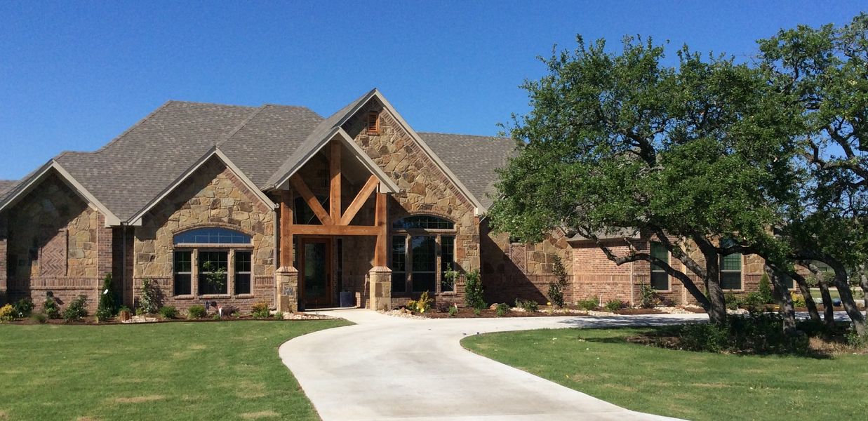Representative exterior photo of a completed home built from the 066-3414-0614 by Abba River Homes in Stanford Estates, Springtown, TX (Image 1). Representative exterior photo of a completed home built from the 066-3414-0614 by Abba River Homes in Stanford Estates, Springtown, TX (Image 1).