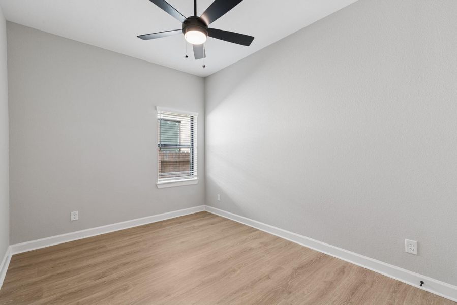 Spacious, unfurnished interior of a new home in The Meadows at Imperial Oaks, Conroe (Image 24).