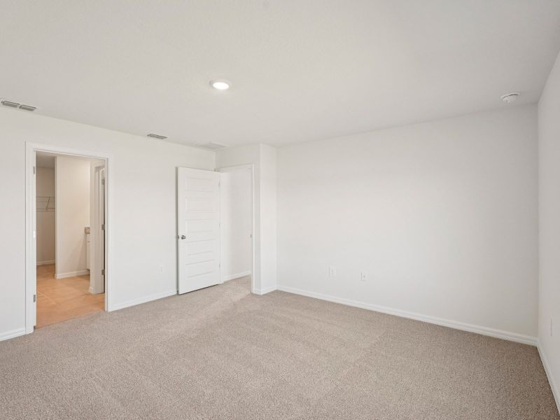Spacious, unfurnished interior of a new home in Coasterra - Premier Series, Palmetto (Image 13).