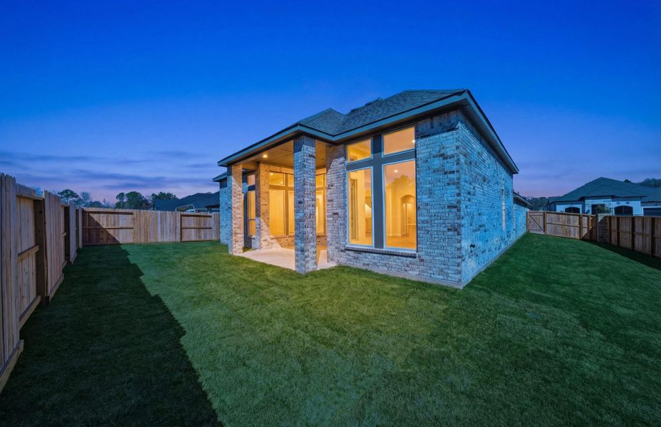 Exterior details and patio area of a home in The Highlands 55′, Porter (Image 24).