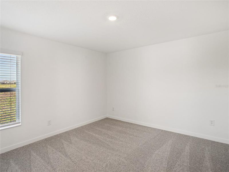 Spacious, unfurnished interior of a new home in Trilby Crossing, Brooksville (Image 8).