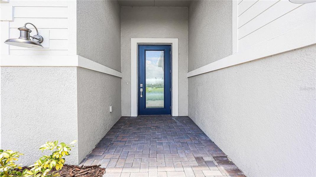 Exterior details and patio area of a home in Woodland Preserve, Parrish (Image 3).