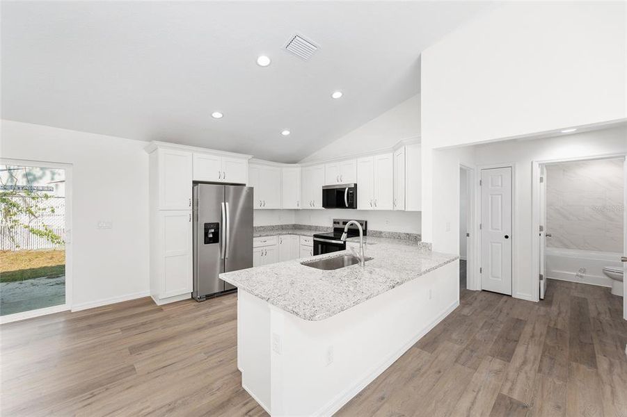 Furnished interior view inside a new home in , Ocala (Image 35).