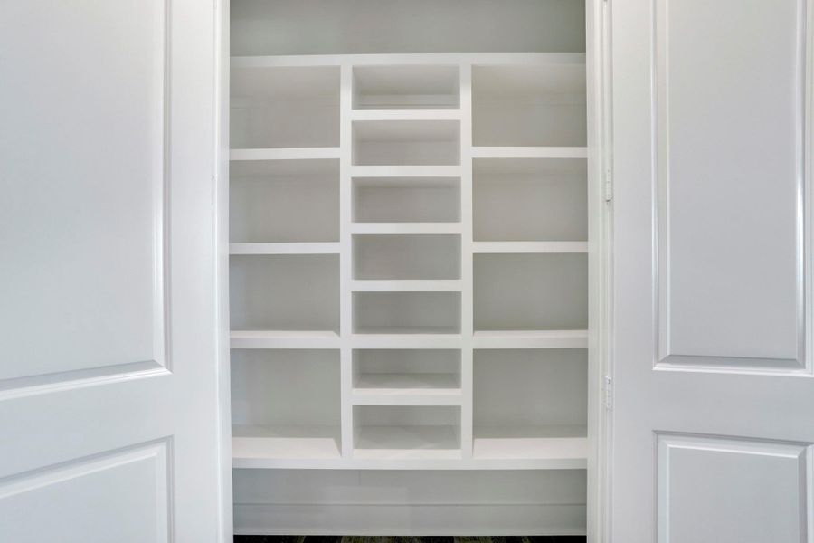 A view of the pantry shelving. A view of the pantry shelving.
