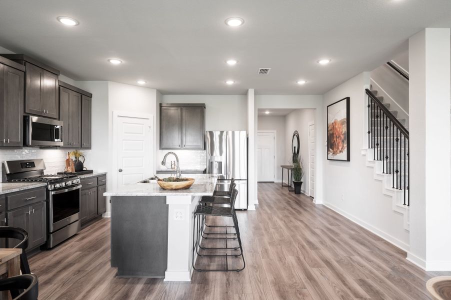 Furnished interior view inside a new home in Mason Woods, Cypress (Image 3).