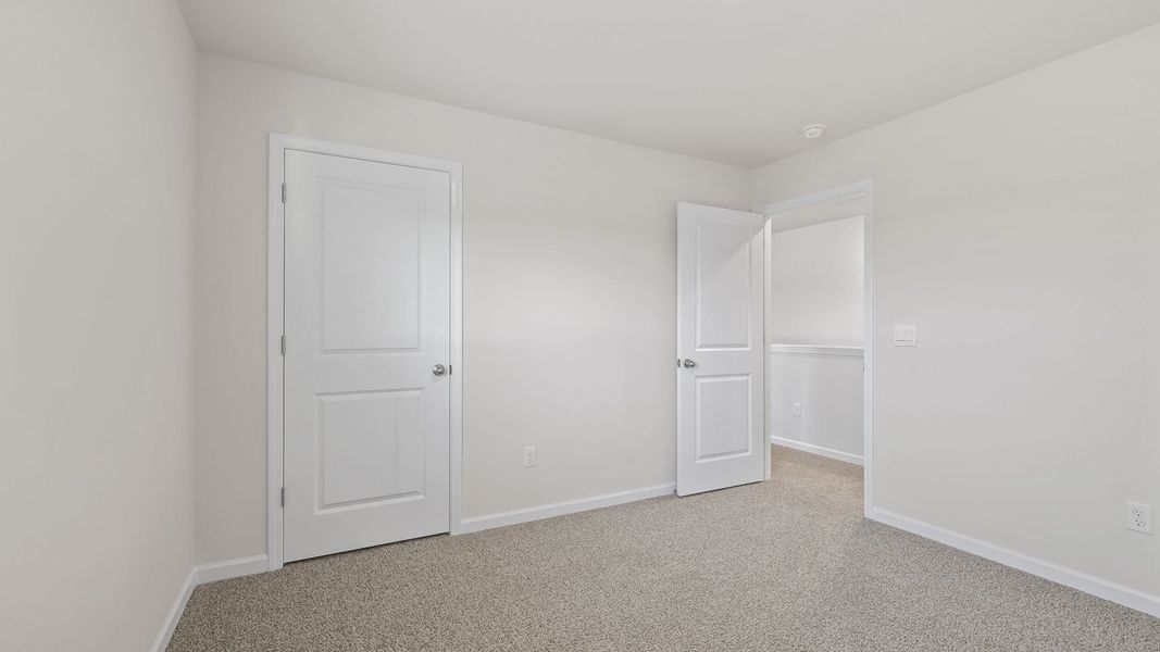 Spacious, unfurnished interior of a new home in Bentley Park, Greenwood (Image 23). Spacious, unfurnished interior of a new home in Bentley Park, Greenwood (Image 23).
