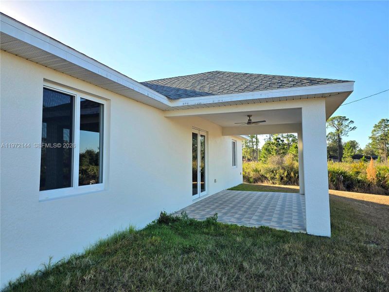 Exterior details and patio area of a home in , Lehigh Acres (Image 3).