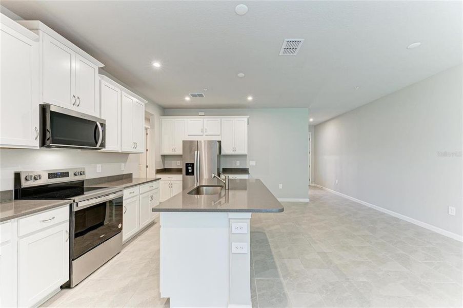 Furnished interior view inside a new home in Wellen Park, Venice (Image 6).