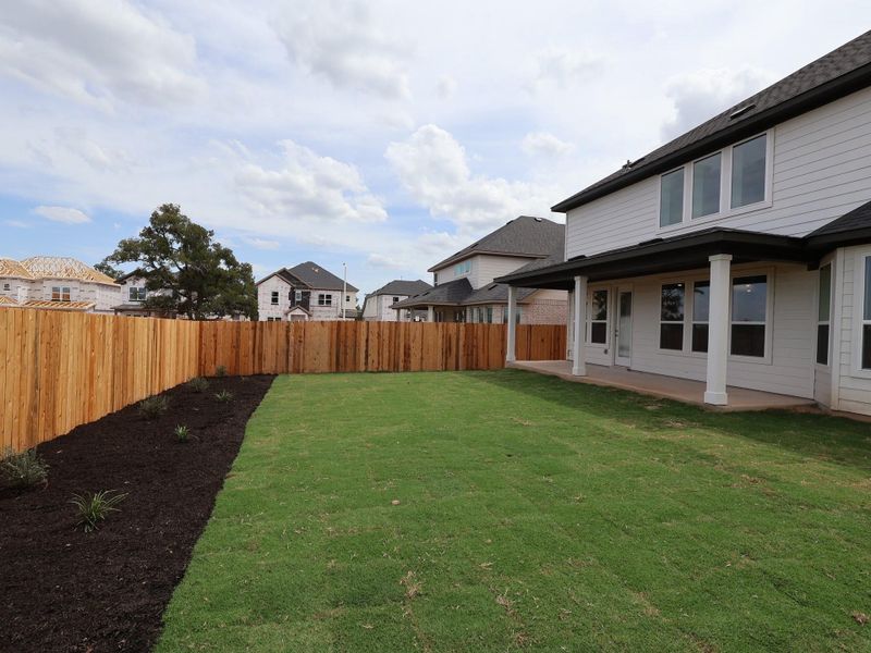 Exterior details and patio area of a home in Edgewood, Leander (Image 4). Exterior details and patio area of a home in Edgewood, Leander (Image 4).