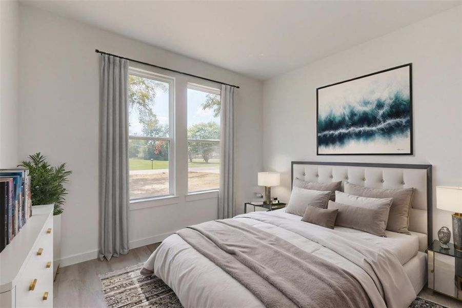 Bedroom with wood-type flooring