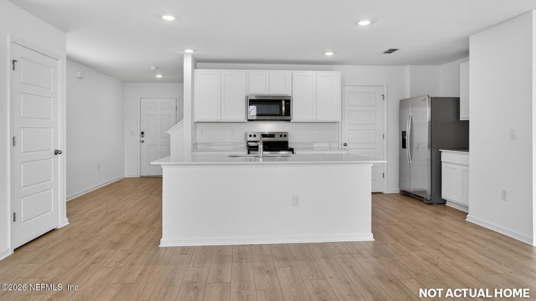 Furnished interior view inside a new home in Rookery, Green Cove Springs (Image 3).