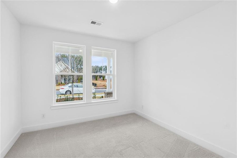 Spacious, unfurnished interior of a new home in Maple Grove at Towne Lake, Woodstock (Image 11).