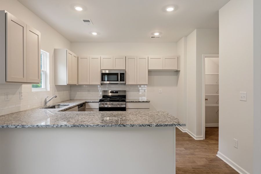 Furnished interior view inside a new home in Richmond Hill, Inman (Image 13).