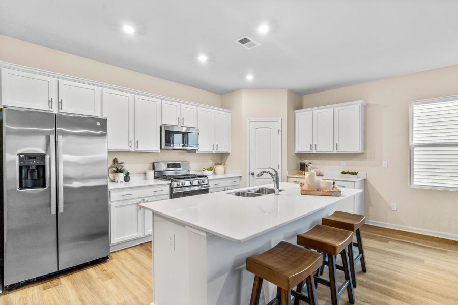 Representative furnished interior of a home built from the The Primrose by Chesapeake Homes in Coastal Club of the Carolinas, Calabash (Image 26).