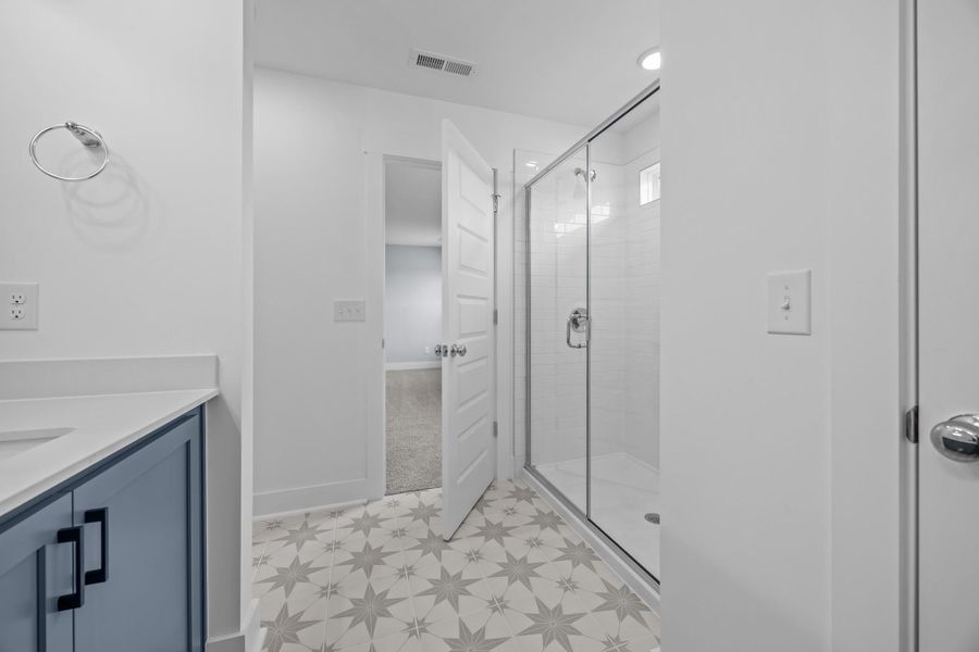 Representative furnished interior of a home built from the Blue Satin Sashes by Garman Homes in Spring Valley, Trinity (Image 5).