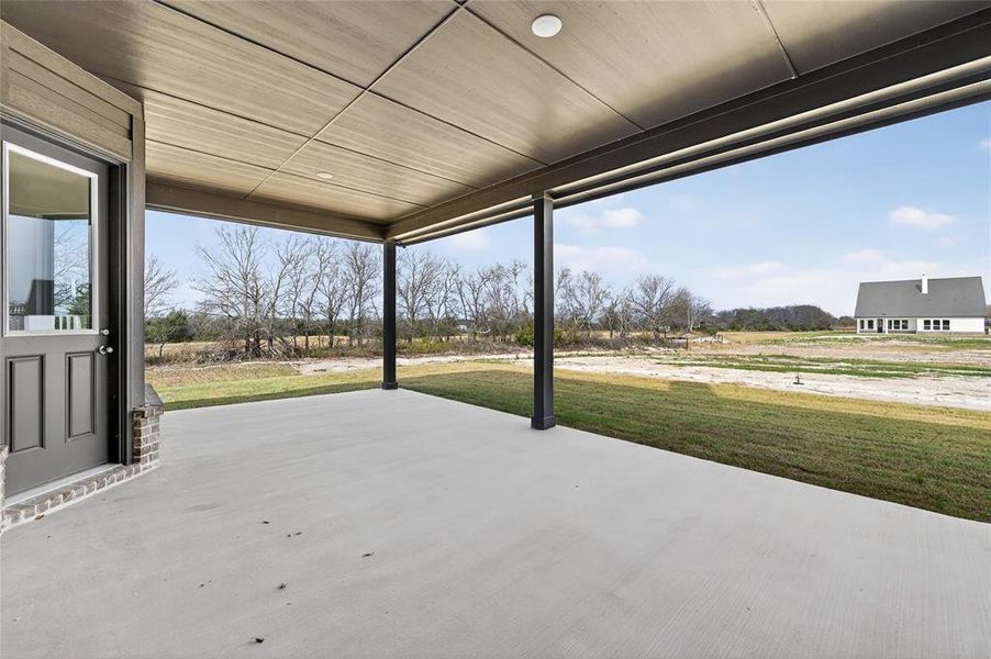 Exterior details and patio area of a home in Nash Estates, Tom Bean (Image 28).