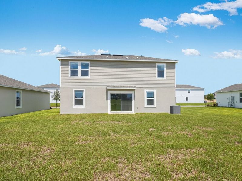 Representative exterior photo of a completed home built from the Azalea by Taylor Morrison in Scenic Terrace, Lake Hamilton, FL (Image 27).