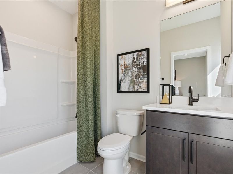 Representative furnished interior of a home built from the Dahlia by Tri Pointe Homes in Bellflower, Charlotte (Image 30).