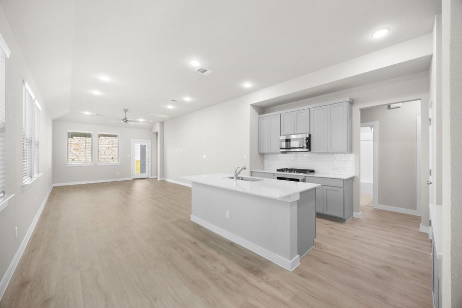 Kitchen in the Elm home plan by Trophy Signature Homes – REPRESENTATIVE PHOTO Kitchen in the Elm home plan by Trophy Signature Homes – REPRESENTATIVE PHOTO