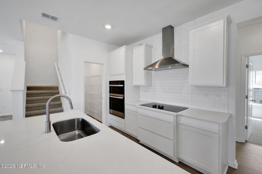 Furnished interior view inside a new home in Hyland Trail, Green Cove Springs (Image 10).